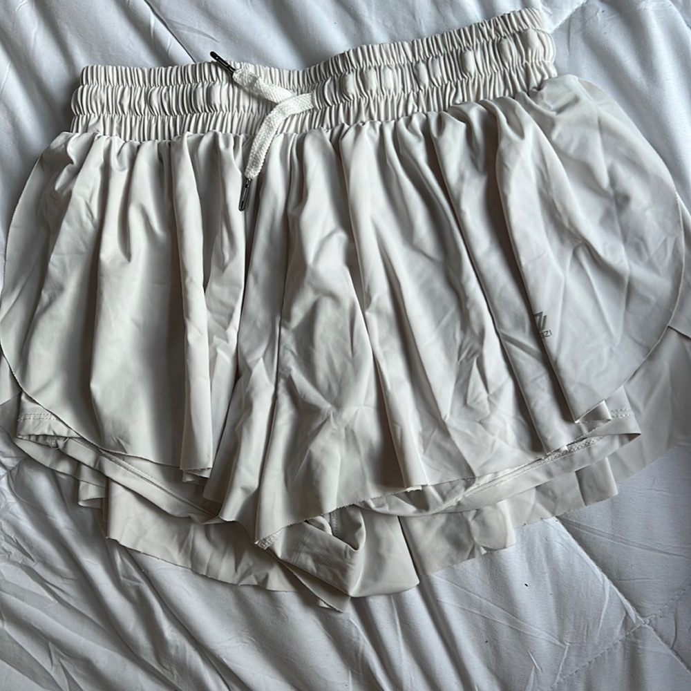 Size Small, “butterfly” shorts, worn, cream color